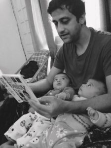 father-reading-to-children