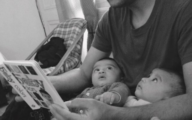 father-reading-to-children